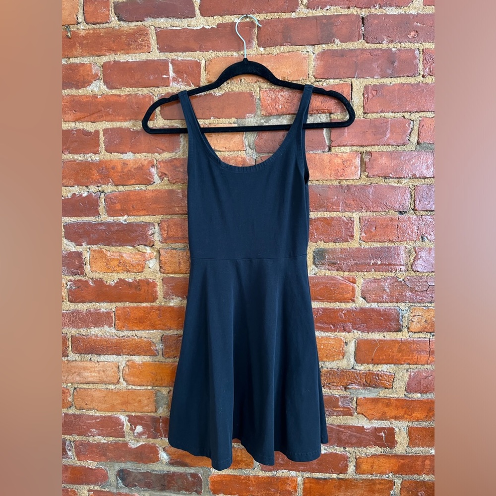 XSP black Express mini dress with green zipper in back